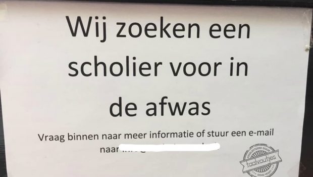 Scholier voor in de afwas